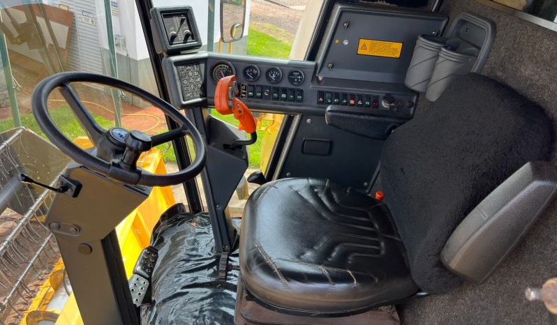 New Holland TC 57 [2006] cheio